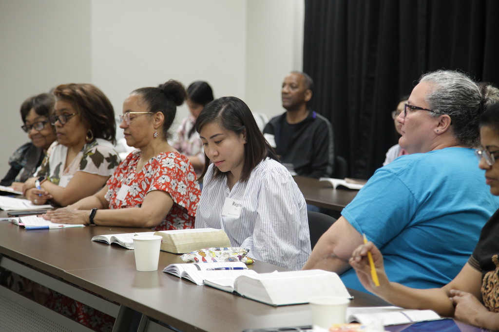 Adults learning together in a King’s Park discipleship class